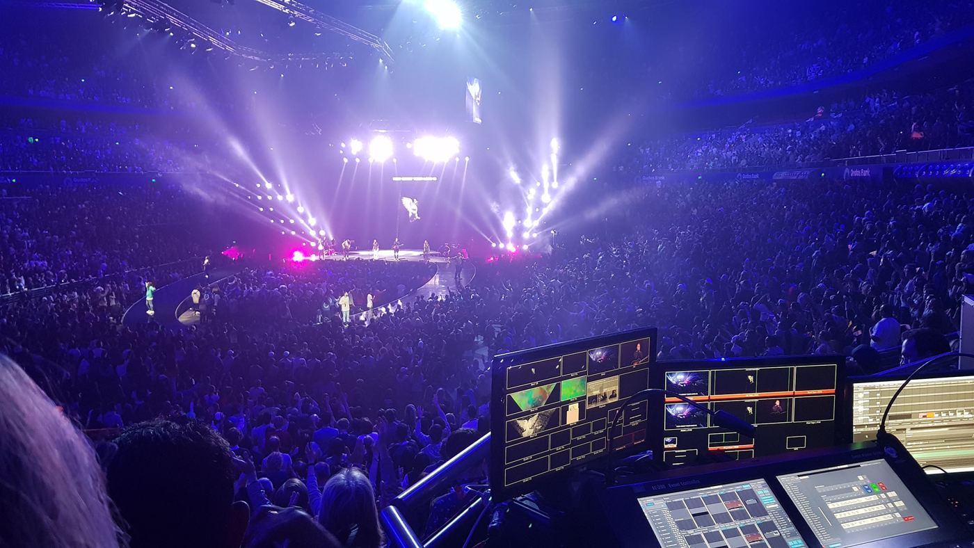 View from the broadcast desk at a Christian conference in a full arena